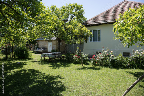 Picture of beautiful village house with garden. Azerbaijan village in summer time photo