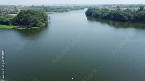 Aerial footage of scene at the confluence of rivers BhimaBhama and Indrayni at Tulapur near Pune India. photo