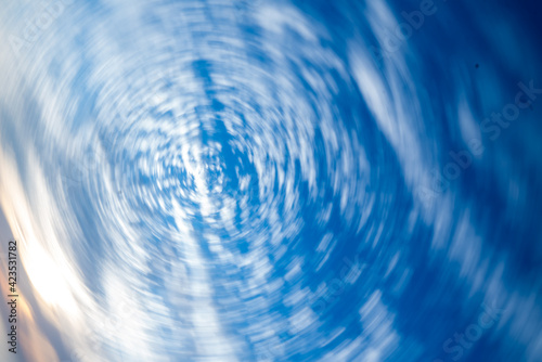 Spinning blue clouds