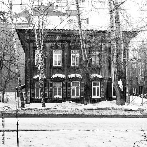 Bild auf Leinwand Old wooden houses under the snow