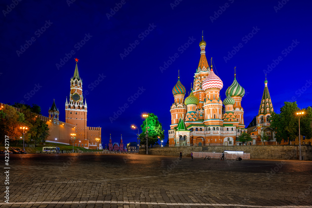 Saint Basil's Cathedral, Spasskaya Tower and Red Square in Moscow, Russia. Architecture and landmarks of Moscow. Night cityscape of Moscow Kremlin