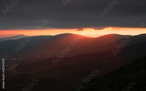 Beautiful glow from the sun shining warm light over the ridges of Shenandoah National Park in the morning.