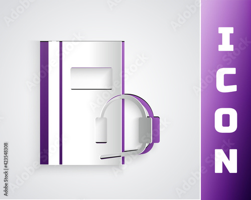 Paper cut Audio book icon isolated on grey background. Book with headphones. Audio guide sign. Online learning concept. Paper art style. Vector Illustration