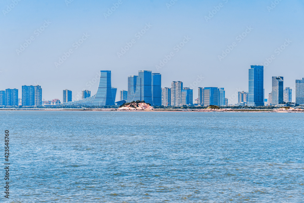 Fototapeta premium CBD building in the central city of Xiamen by the sea in Xiamen, Fujian, China