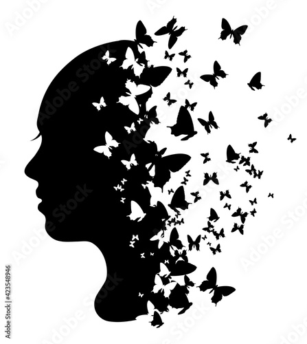 Silhouette of a girl with butterflies