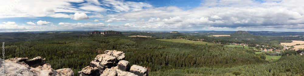 Fototapeta premium Panorama of the Elbe Sandstone mountain range with table mountains