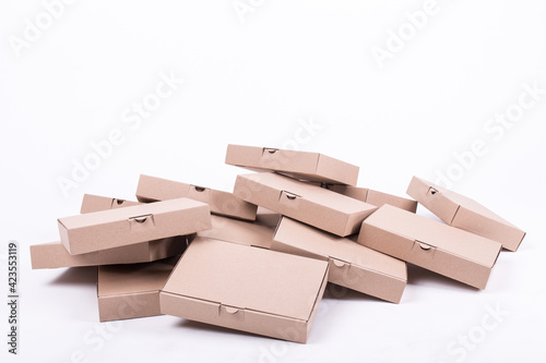 Stack of boxes of the same size isolated on white background