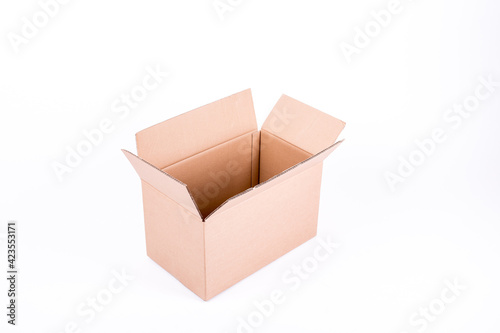 Open cardboard box on white background, mid sized, empty