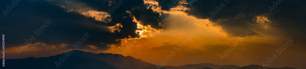 sun behide the cloud with sunset for background