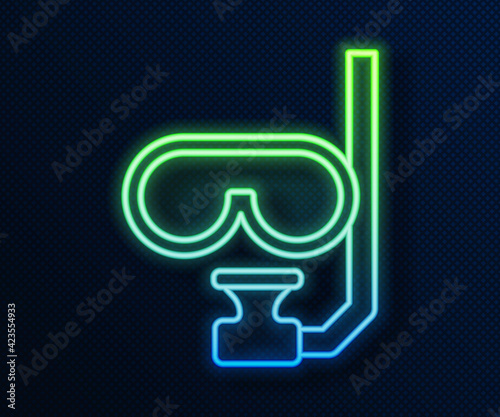 Glowing neon line Diving mask and snorkel icon isolated on blue background. Extreme sport. Diving underwater equipment. Vector