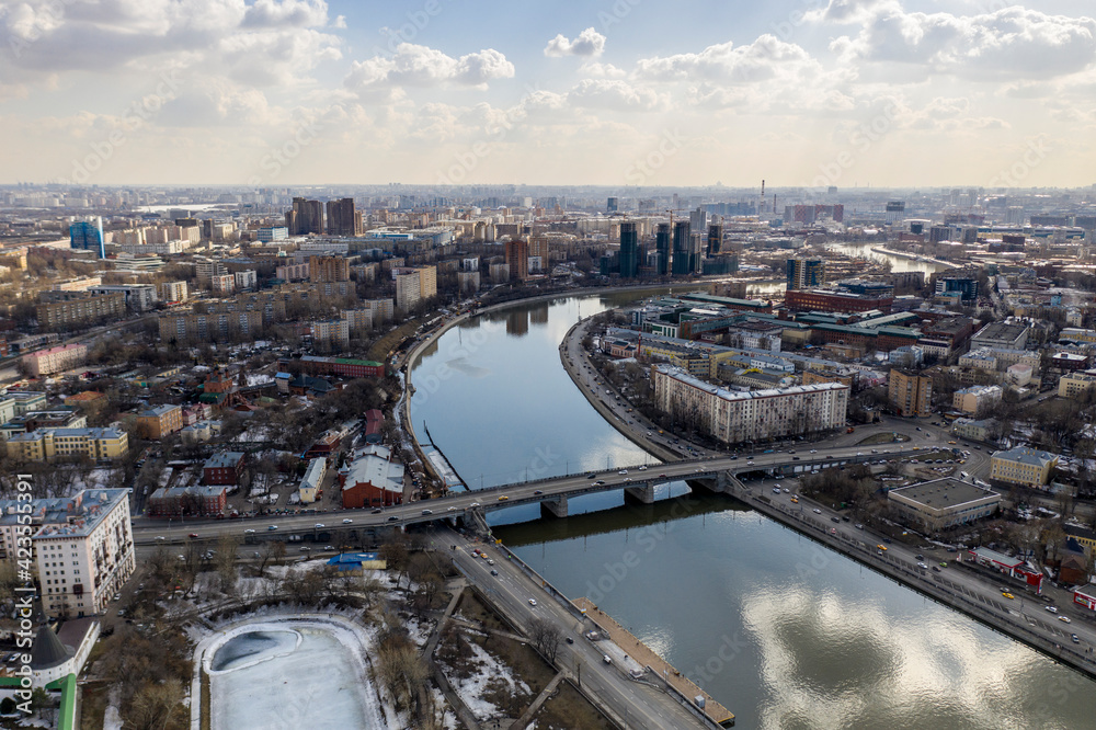 Obraz premium panoramic view from drone on cityscape with river and bridges 
