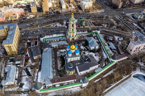 a panoramic view from a drone of an ancient fortress with domes in the city center 