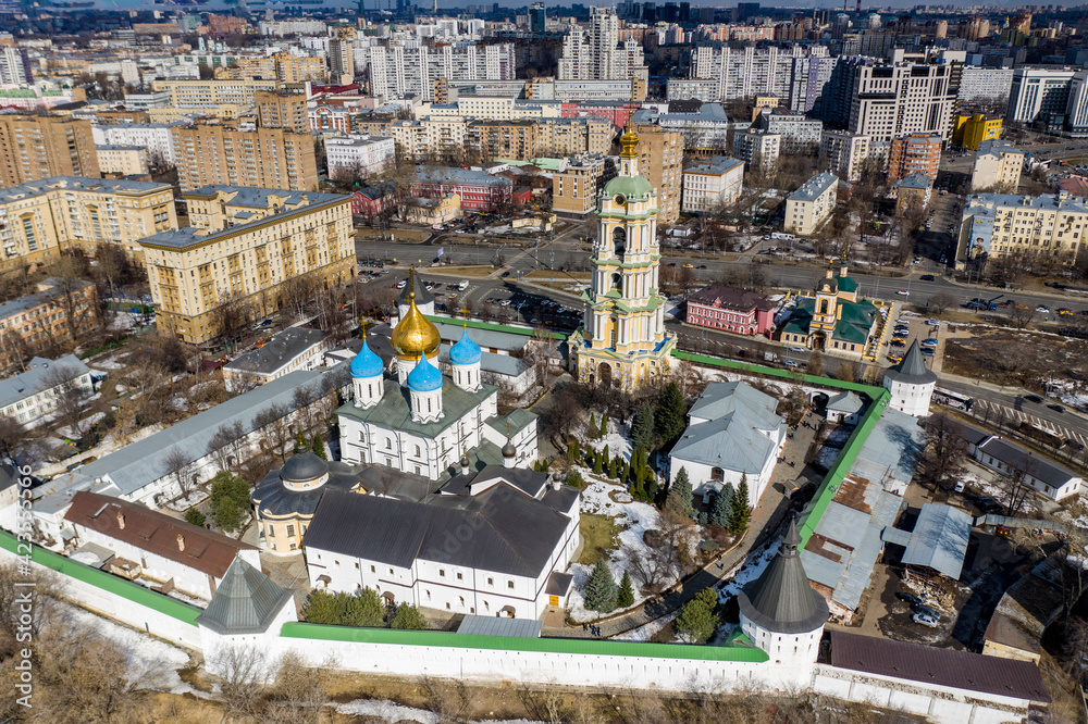 a panoramic view from a drone of an ancient fortress with domes in the city center 