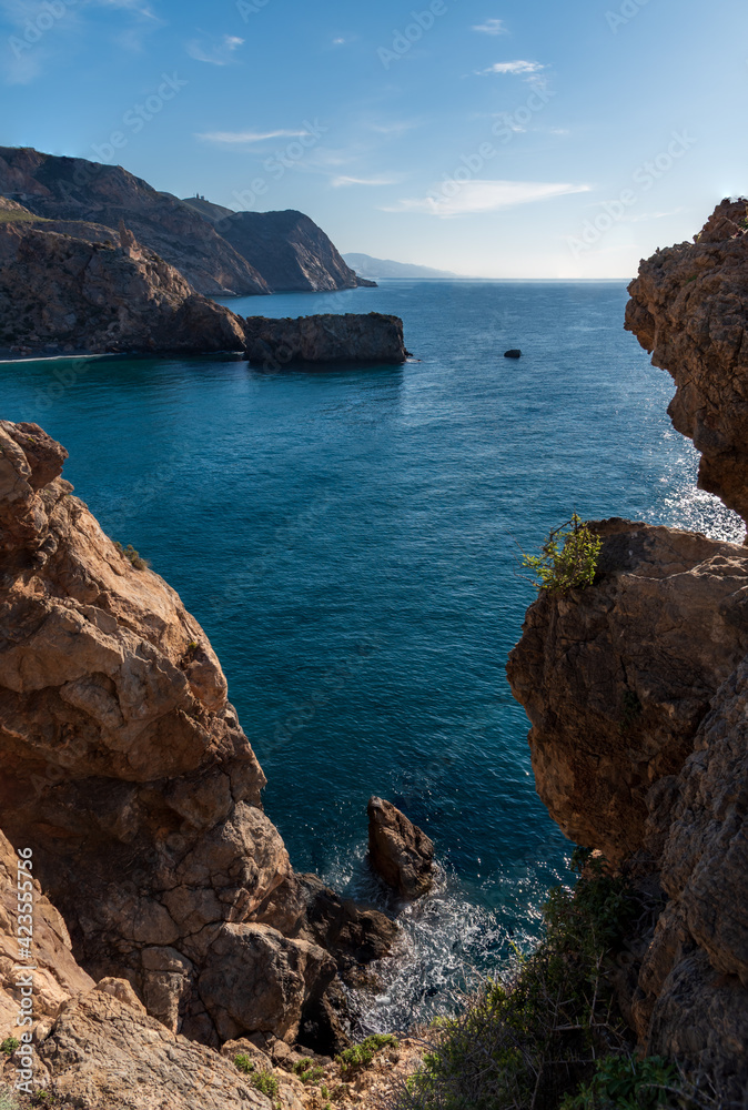 Cliffs next to the Rijana beach on the tropical coast of Granada.