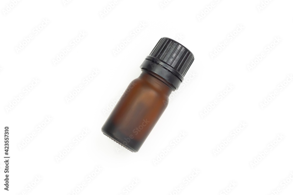 Small glass bottle isolated on white background. Essential oil bottle. Small glass bottle isolated on white background. Essential oil bottle.