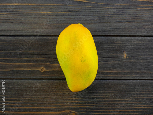 One Mango still life, Nam Dok Mai on the table top view, flat lay fruit