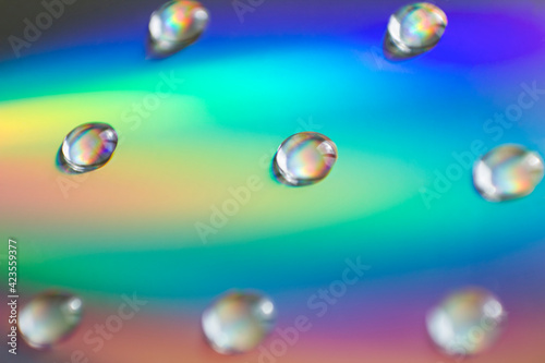 Water drops on a beautiful colored background