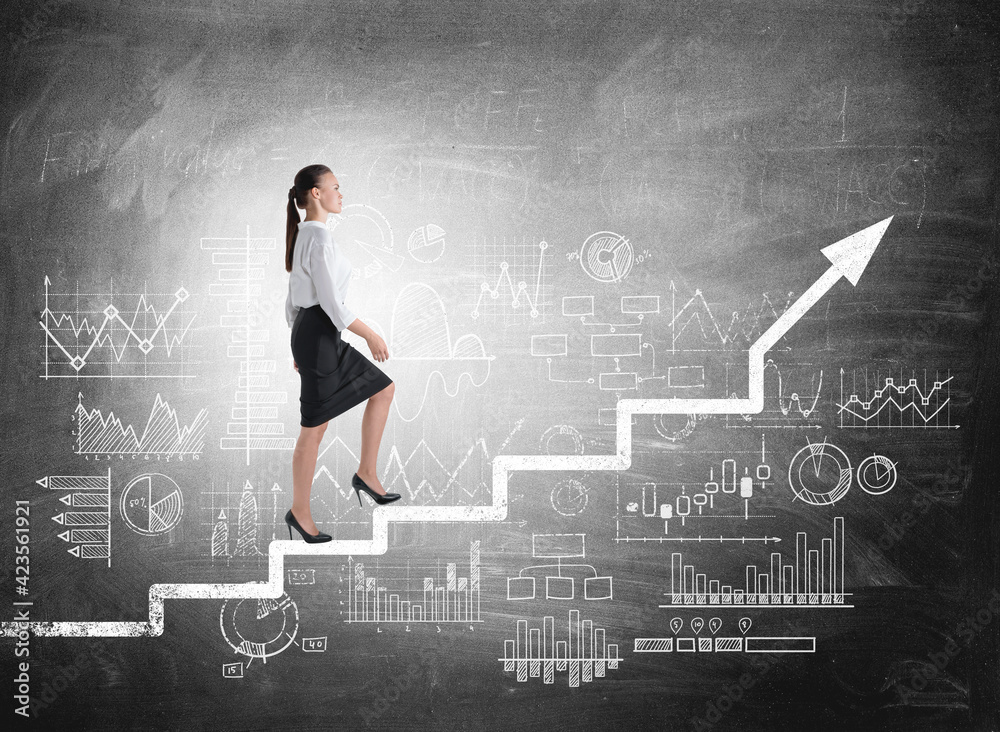 Businesswoman going up on stairs, blackboard with graph and charts Businesswoman going up on stairs, blackboard with graph and charts