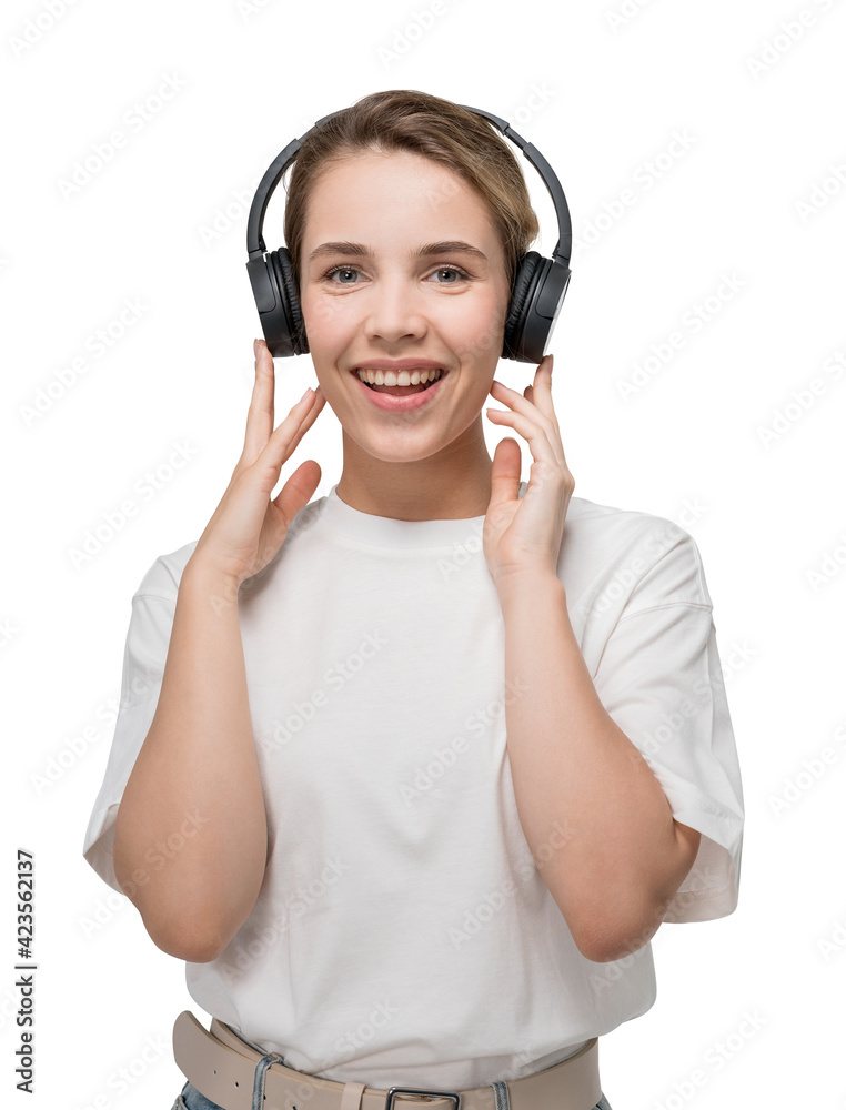 Smiling young woman wearing headphones, isolated over white background Smiling young woman wearing headphones, isolated over white background