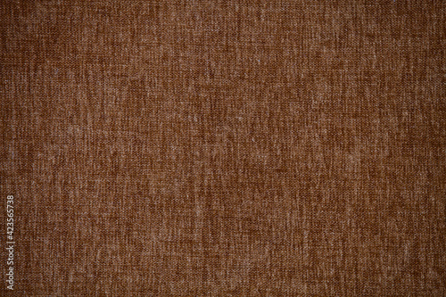 Brown fabric, heathered texture and pattern visible. Isolated