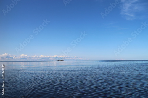 blue lake  beautiful seascape clear sky cloud on the horizon