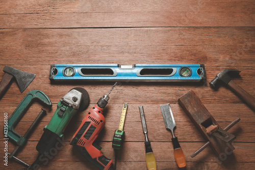 carpentry and woodwork tools on wooden background, capenter working table, Vintage. photo