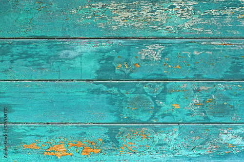 Vászonkép Wooden background with teal blue colored old weathered  planks with chipped pain