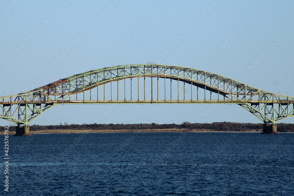 Fototapeta premium City harbor bridge with the sea under it.