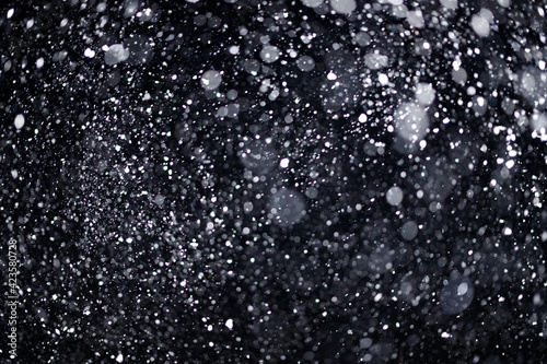 Real falling snow on black background for blending modes in ps. Ver 04 - many snowflakes in blur
