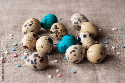 easter eggs on a craft background with decorative sprinkles