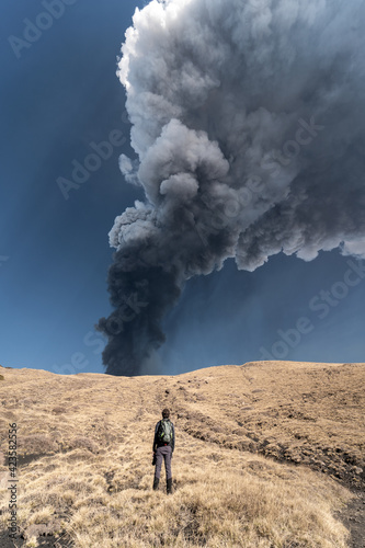 Wallpaper Mural Guy admiring an incredible eruption of the Etna volcano, Sicily Torontodigital.ca