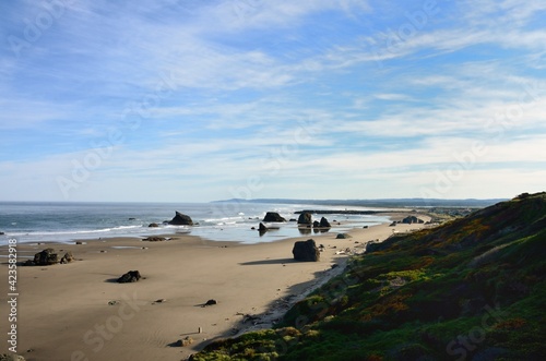 Looking Down At Coquille Point Beach  With The South Jetty Of The Coquille River In the Distance