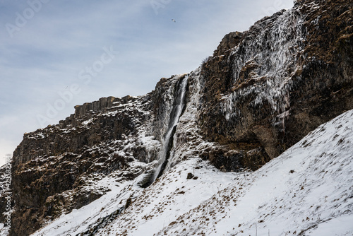 Icelandic waterfall Seljalandsfoss durind winter time photo