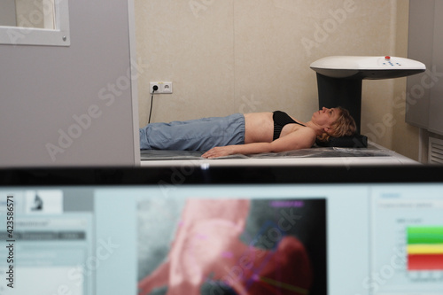 Investigation of the density of human bones using an osteodensitometry apparatus.