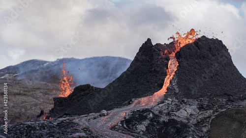 Fototapeta Naklejka Na Ścianę i Meble -  A small volcanic eruption in Mt Fagradalsfjall, Southwest Iceland, in March 2021. The eruption occurred on the Reykjanes peninsula, only about 30 km away from Reykjavík.