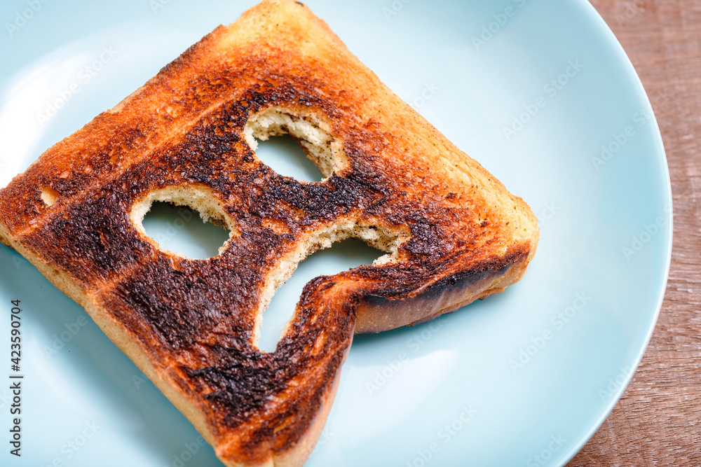 Burnt toast and Sad Face - obrazy, fototapety, plakaty 