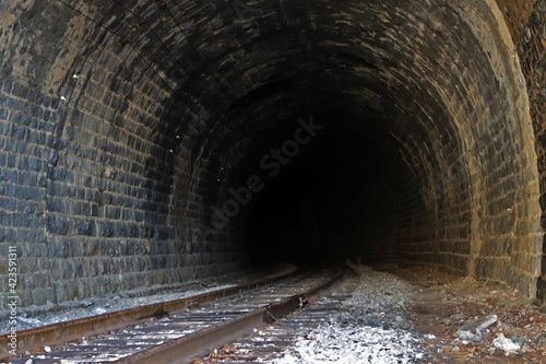 Darkness in the depths of the railway tunnel