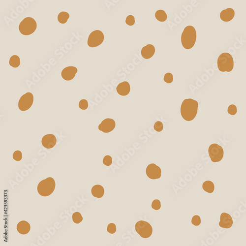Background for a postcard with gold dots. Fashion textile pattern with golden polka dots. Hand-drawn dots light background. Yellow-gold dot isolated pattern. Vector illustration