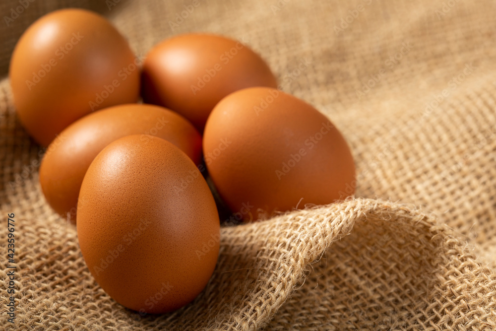Brown chicken eggs rises on the table. Brown chicken eggs rises on the table.