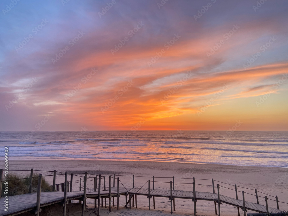 Suave Mar Beach at sunset in Esposende, Portugal. This beach, extensive in sand, is bathed in part by the mouth of the river Cávado in the south. Integrated within the Northern Littoral Natural Park.