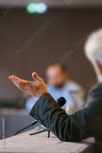 people debating at seminar presentation