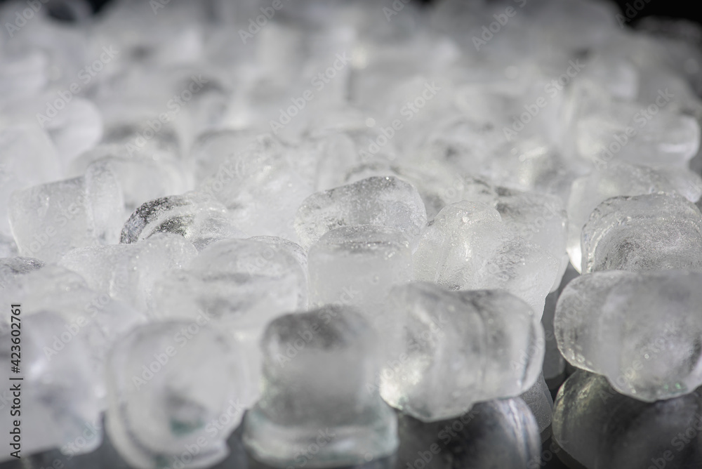 Frame of crushed ice on a black background, ice for drinks. Copy space, top view Frame of crushed ice on a black background, ice for drinks. Copy space, top view