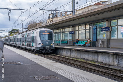 Paris, France 28-03-2021: the arrival of the train at the vesinet station