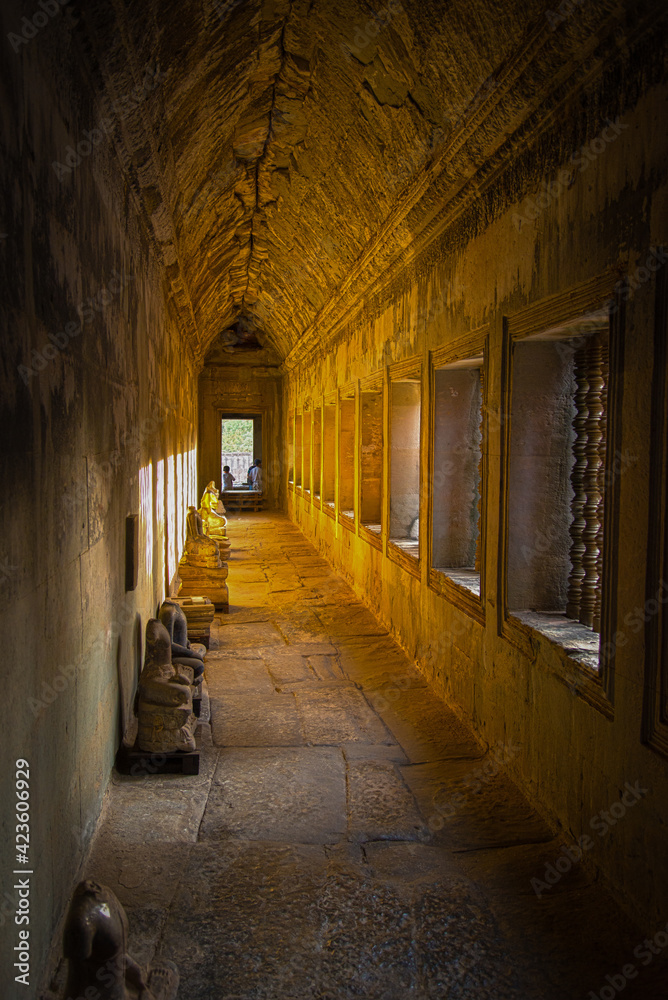 golden light in the temple hallway
