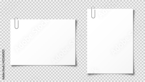 Realistic blank paper sheet in A4 format on transparent background. Notebook page, document with steel paper clip. Design template or mockup. Vector illustration.