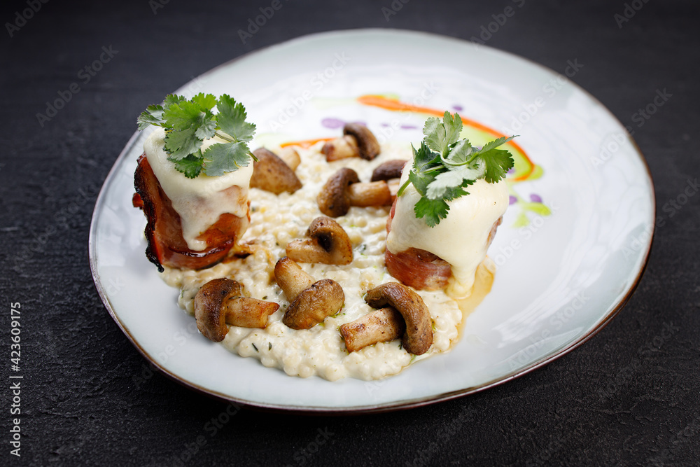 Delicious mushroom risotto and grilled turkey meat Delicious mushroom risotto and grilled turkey meat