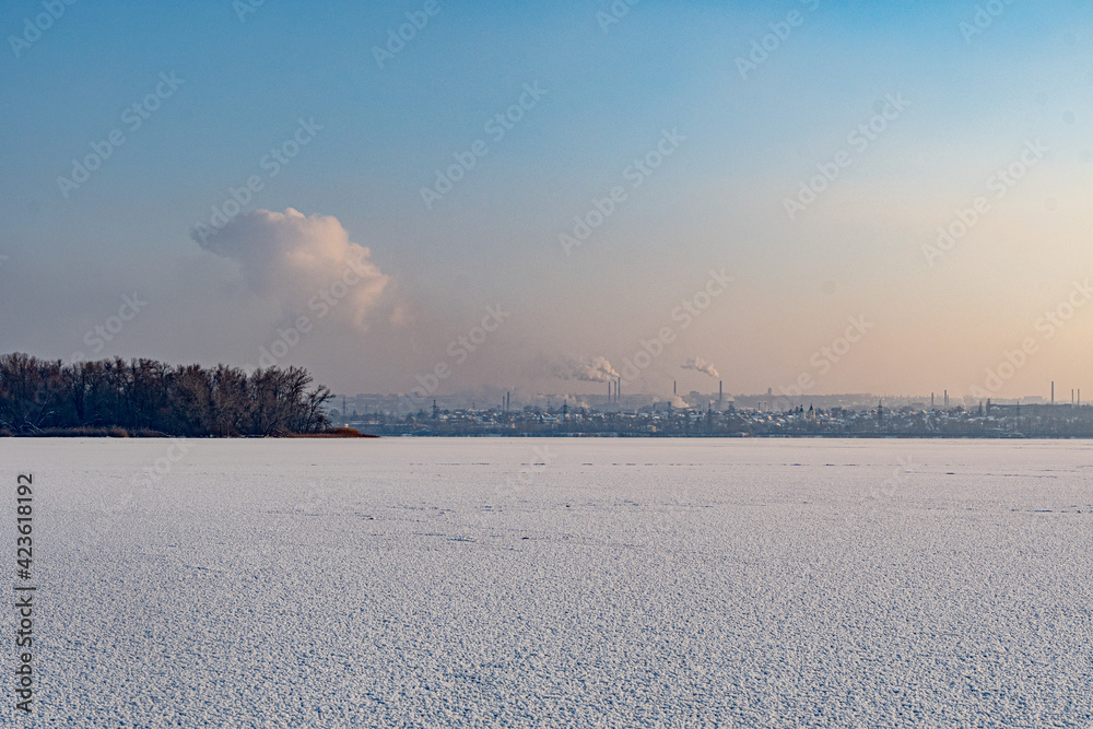Winter landscape on a frozen river.