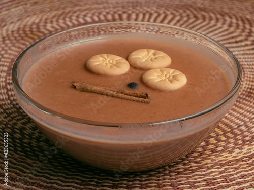 Beans with sweet or habichuelas con dulce a dessert from the Dominican Republic made of red beans, milk, sugar and spices. photo