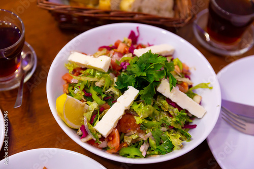 Image of Choban salad with cheese in a Turkish cafe.