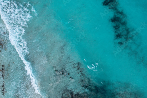 Aerial View of Tropical Water with Sandy Beach Shore © Dave Vagiunic